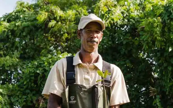 A farmer outside - listing tile